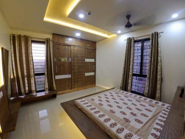 Minimalist Bedroom Featuring Extensive Wood Elements
