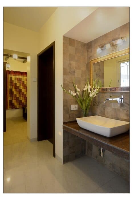 Modern Bathroom Vanity with Oval Sink and Dark Accents