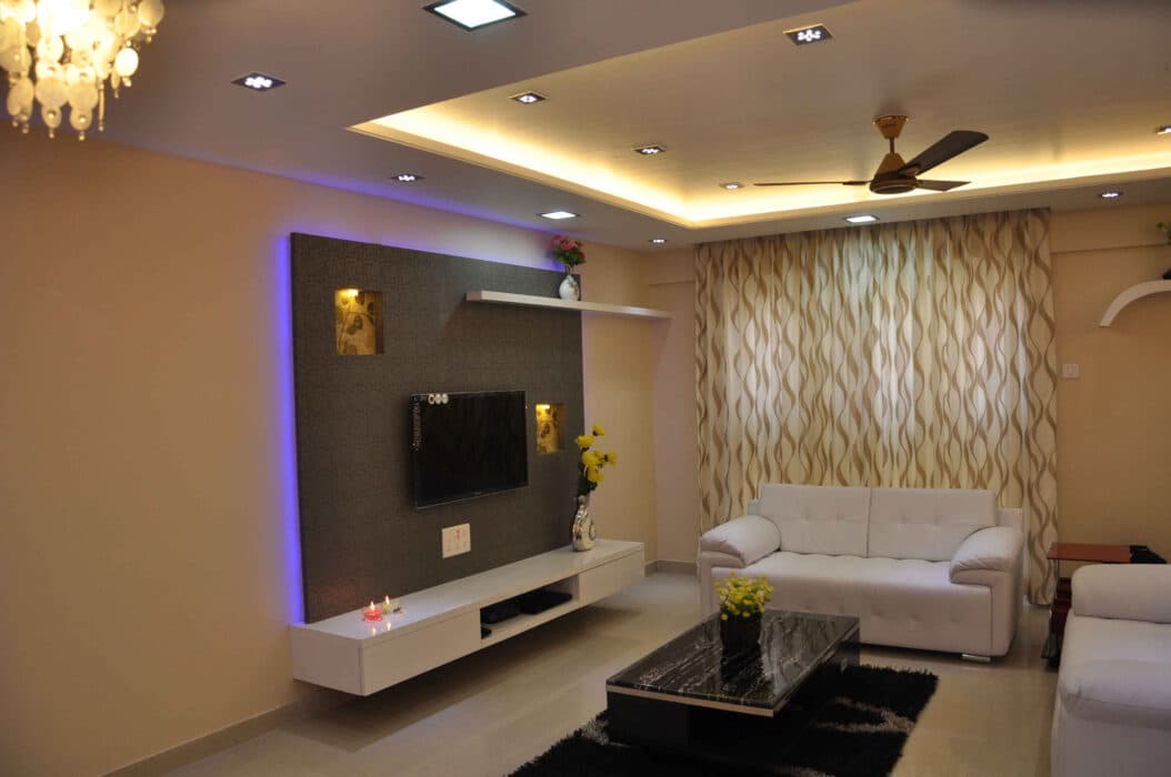 Modern Well-Illuminated Living Room Characterized by Beige Walls