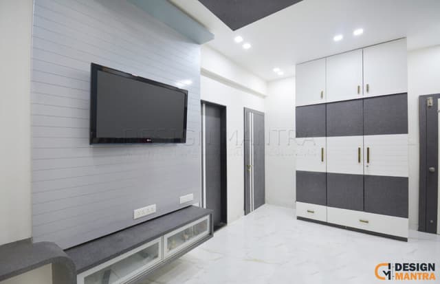 Chic Bedroom Corner Features a TV Unit Design