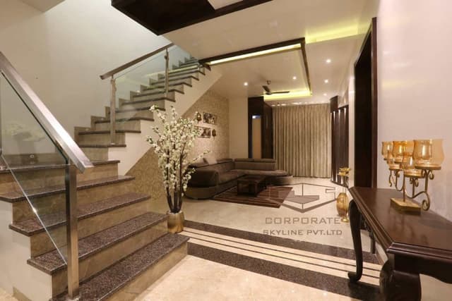 L-Shaped-Staircase-with-Granite-Treads-Glass-Railing-Stainless-Steel-Handrail-in-Living-Room L Shaped Staircase with Granite Treads
