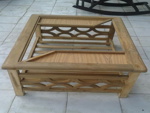 A beautiful carved brown-grained solid wood table A beautiful carved brown-grained solid wood table