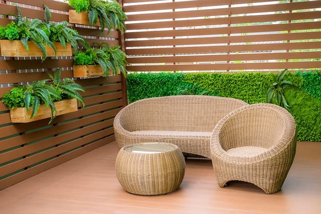 A green corner of the house with cozy seating A green corner of the house with cozy seating
