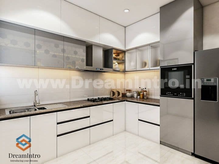 A sparkling white kitchen with white square tiles A sparkling white kitchen with white square tiles