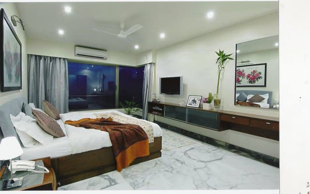 Bedroom consists of Rectangular Wooden Bed Bedroom consists of Rectangular Wooden Bed