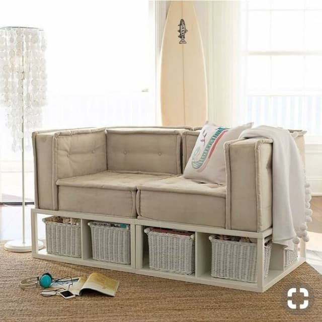 2-Seater Beige Coloured Sofa having High Seating with Rectangular Armrest & Metal Framed Legs having a Storage Space at the Bottom 2-Seater Beige Coloured Sofa having High Seating with Rectangular Armrest & Metal Framed Legs having a Storage Space at the Bottom