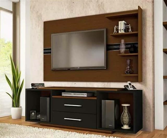 T.V. Unit has Free Standing Black Unit T.V. Unit has Free Standing Black Unit