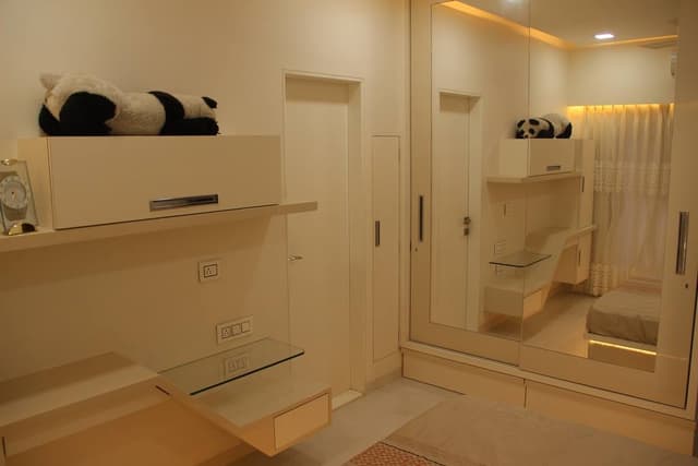 The White Bedroom Consists White Rectangular Bed with Cotton Bedsheet – 1 The White Bedroom Consists White Rectangular Bed with Cotton Bedsheet - 1