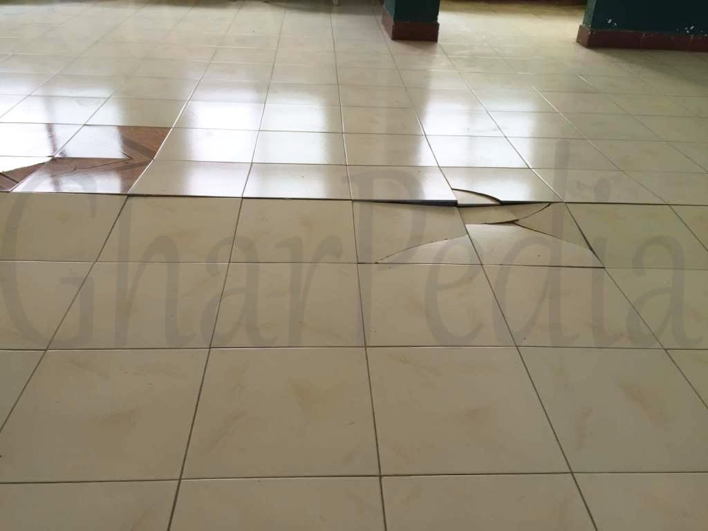 Buckled or Popped-up Tiles