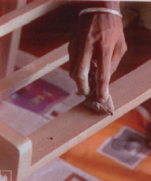 Apply clear polish coat over the dried layer of coloured polish