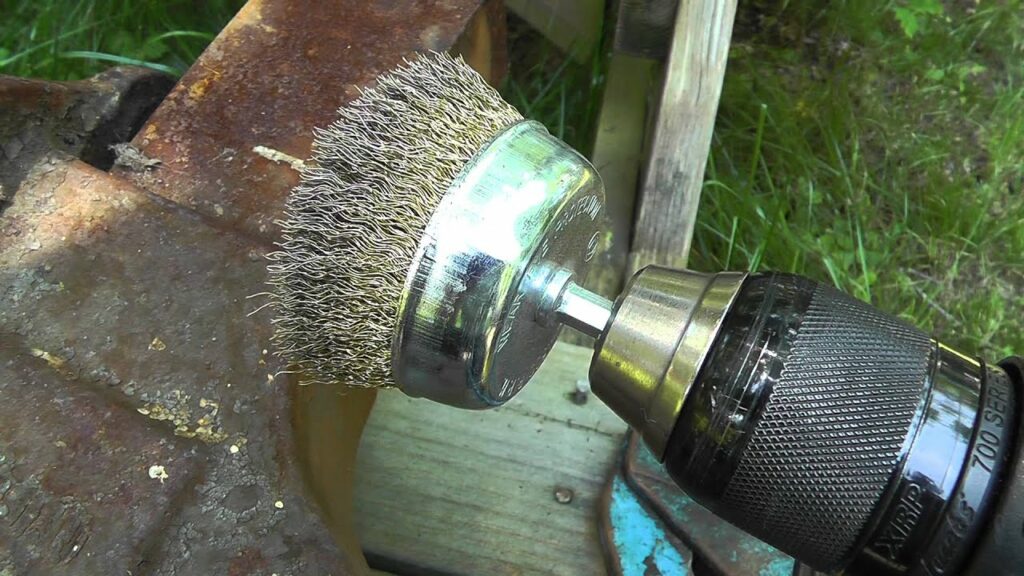 Wire Brushing to Remove Rust from Railing