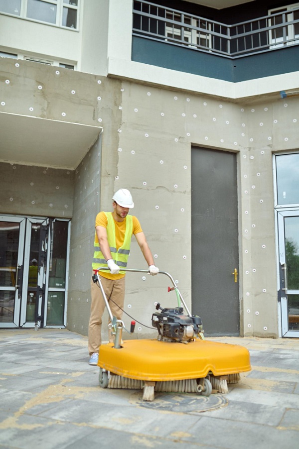 A Good Array of Equipment like Pressure Washer and Experienced Workers for Exterior Home Cleaning