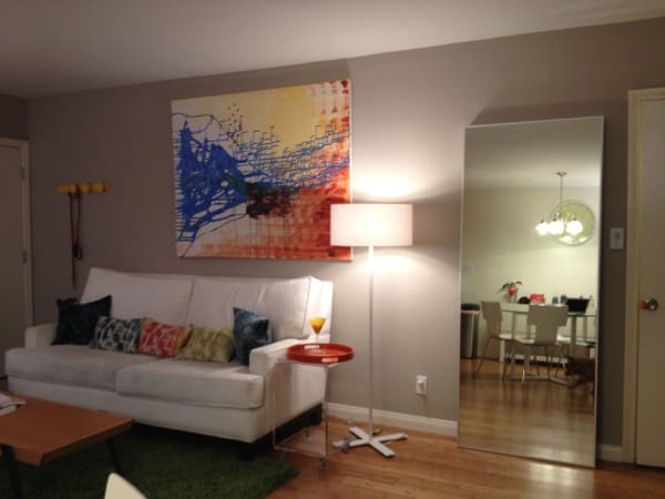 Make Use of Large Mirrors - make your small living room look bigger