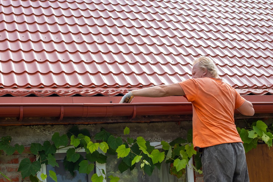 Man Cleaning Your Gutters