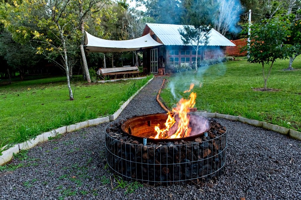 Up-cycled Truck Wheel and Stone Fire Pit