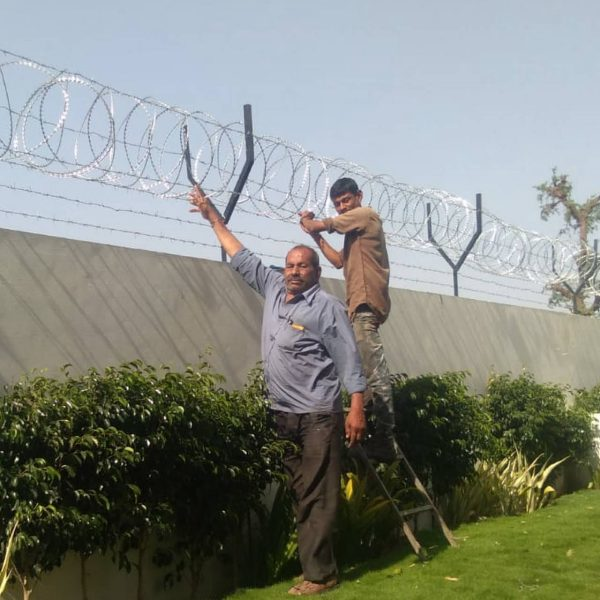 Barbed Wire and Coecentina Coil Fencing Project