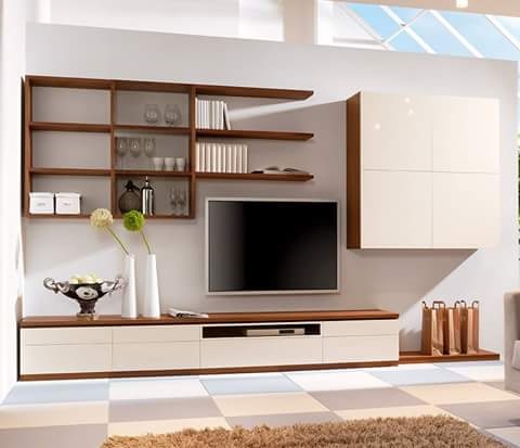 A Wooden TV Unit designed in a Combination of Shelves & enclosed