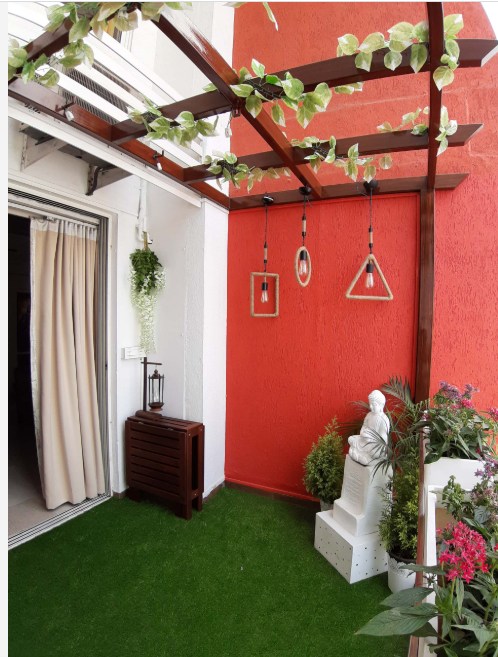 Balcony designed with Artificial Grass Mat on the Floor