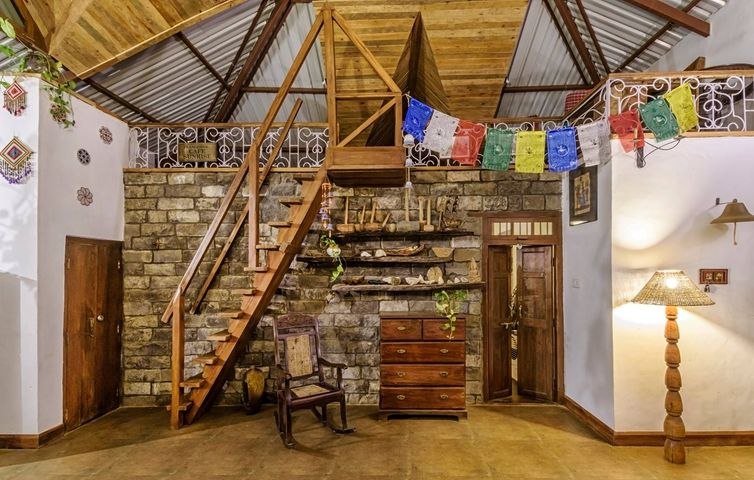 Beautiful Seating Under the Wooden Single Flight Straight Staircase