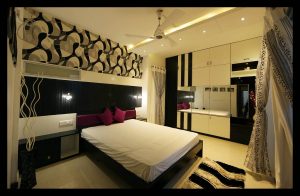 Bedroom with Wooden Bed Attached Side Tables
