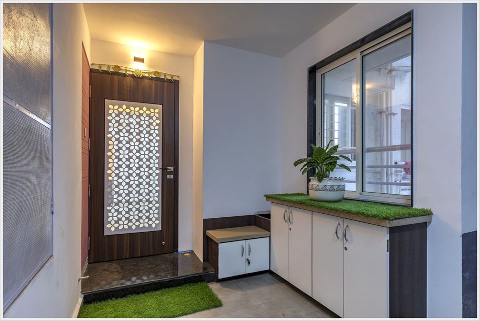 Entrance Foyer with a Wooden Entrance Door