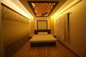 Bedroom incorporating Wooden Bed, Side Tables, Bamboo Wallpaper on one Wall