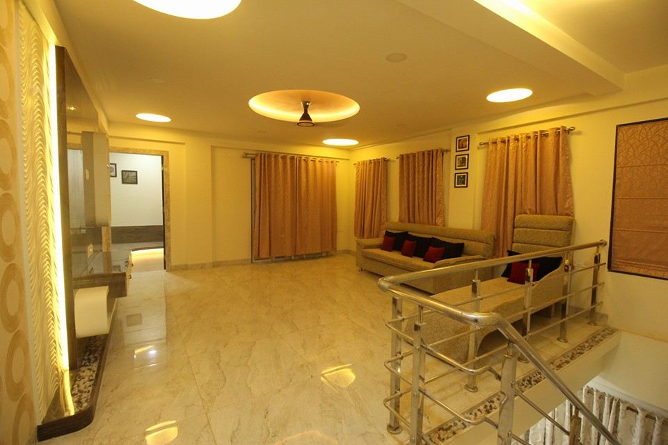 Family Sitting Area besides Staircase on First Floor accommodating Sofa