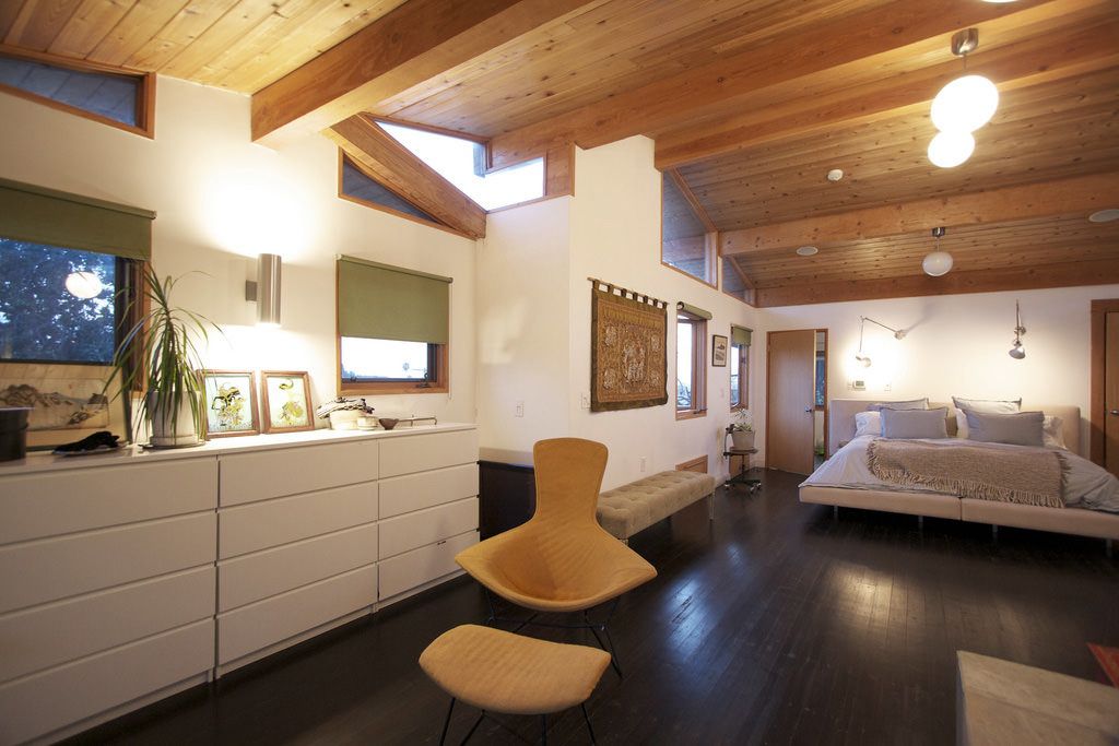 Rustic Bedroom accommodating Bed, T.V., Accent Chair with Footrest