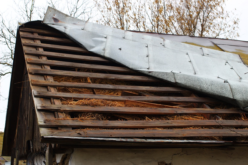 Storm damaged roof Storm damaged roof
