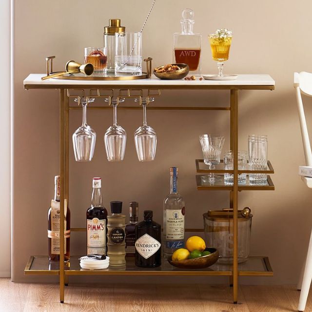 Display of glassware on bar cart Display of glassware on bar cart