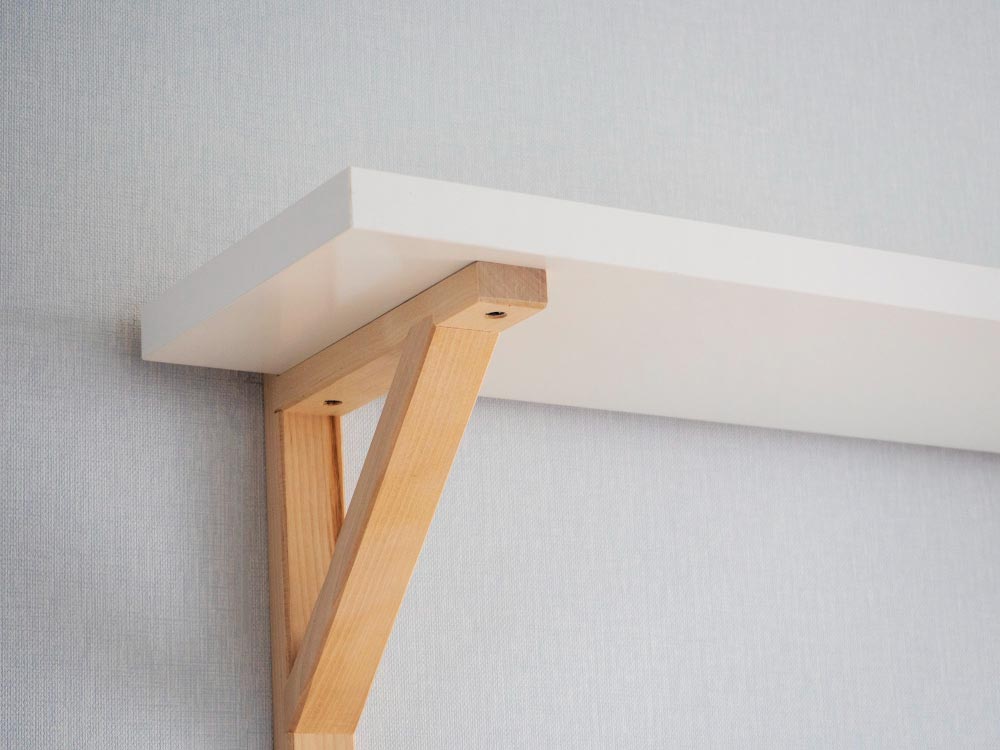 Firmly attach wall support with screws