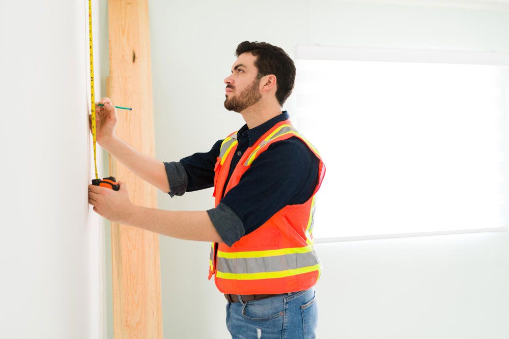 Measure and mark position for floating shelves