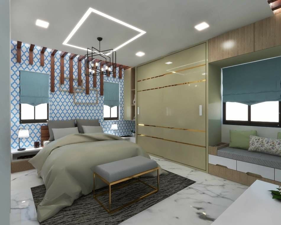 A mix and match with different patterns in the modern designed bedroom with dedicated seating area.
