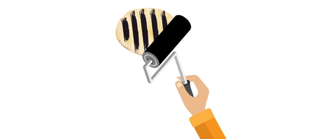 Apply printing ink on carved potato Apply printing ink on carved potato
