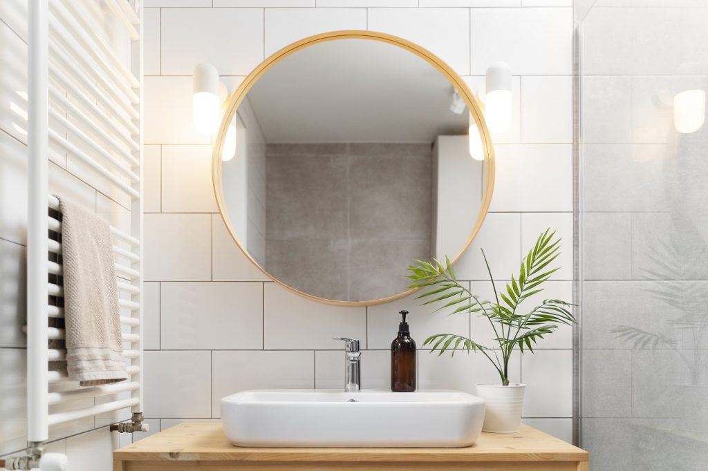 Bathroom Makeover using Lighting and Decor with Plant