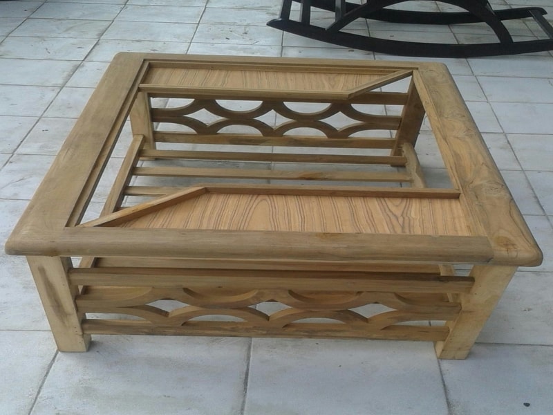 A beautiful carved brown-grained solid wood table