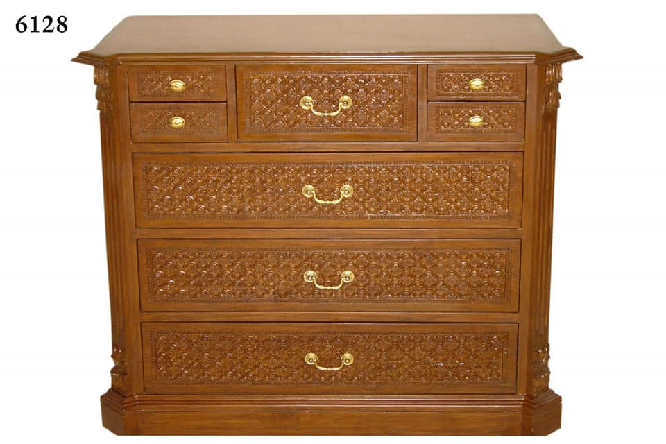 A light brown painted wooden table