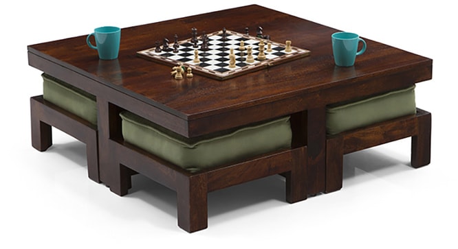 A square dark brown stained wood low height table