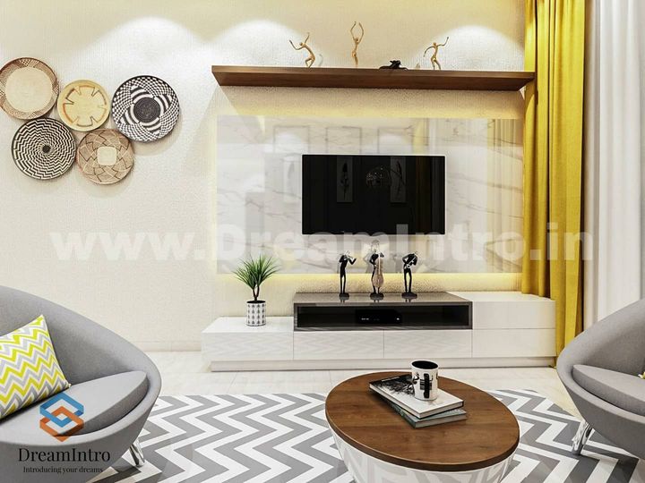 White wall with a white TV unit with pull-out drawers