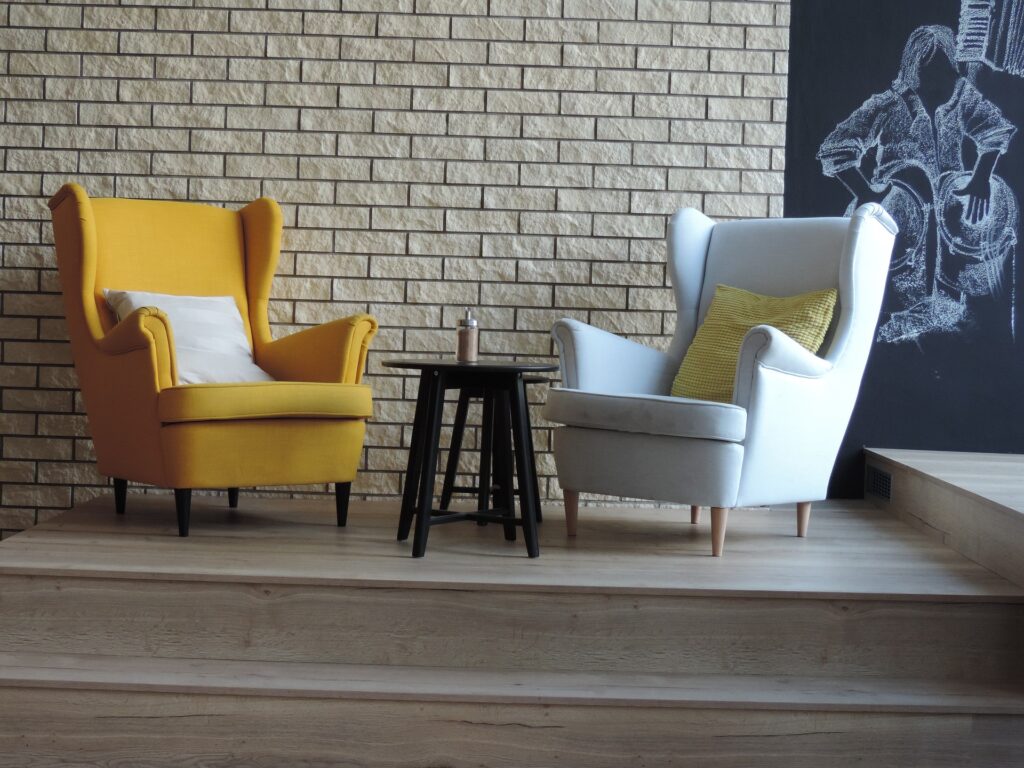 Yellow and white upholstered armchair
