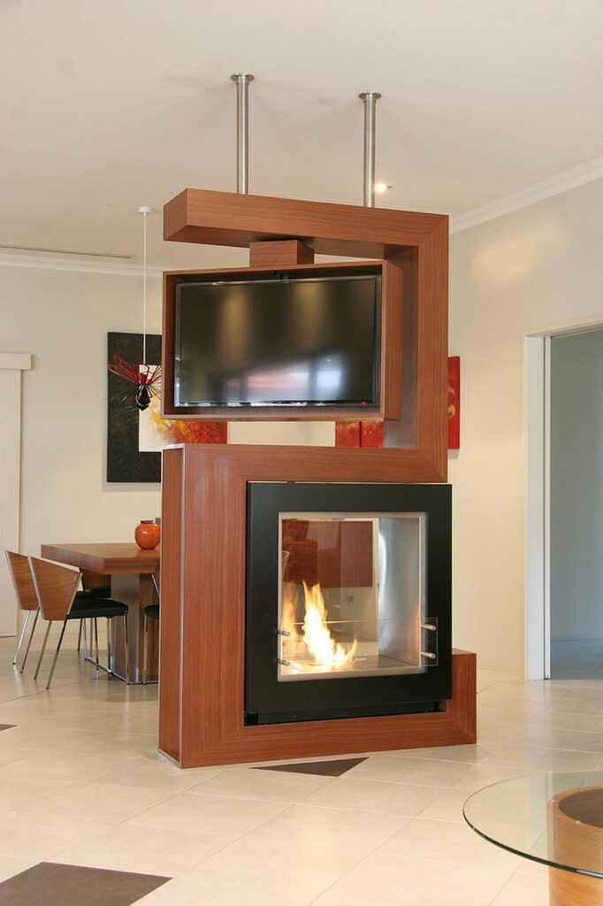 Turn-able TV and Fireplace Divider Turn-able TV and Fireplace Divider