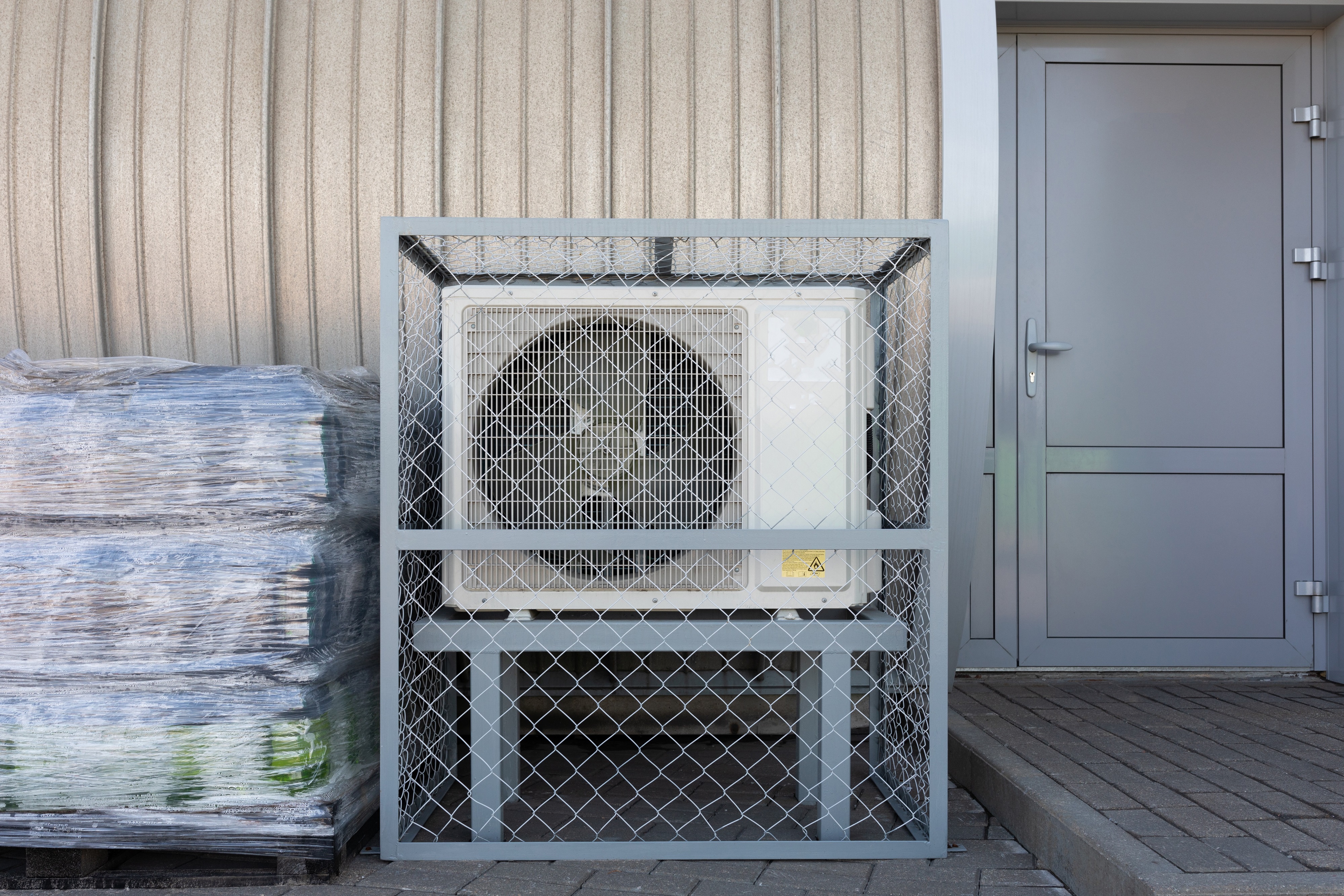 Wire Mesh around outdoor unit of Air Conditioner