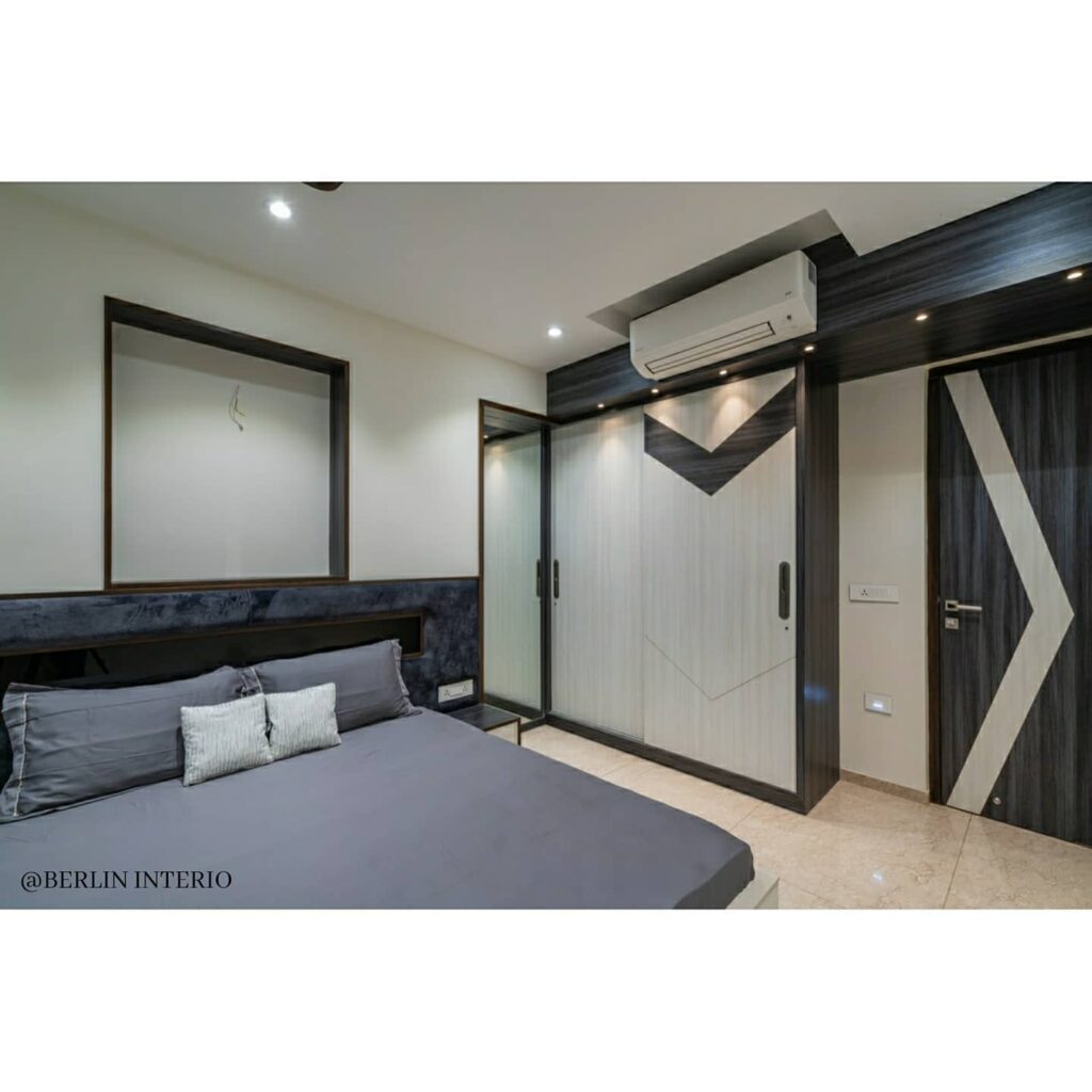 A modern compact bedroom in greys and white - 2