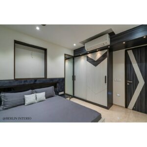 A modern compact bedroom in greys and white - 2