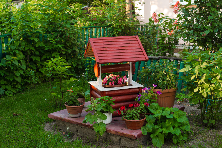 Artificial well - Diy curb appeal landscaping gives personal touch