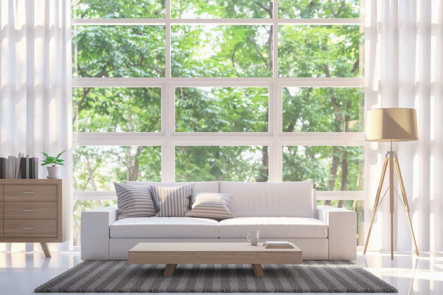 Beautiful and naturally lit room with right window dressing Beautiful and naturally lit room with right window dressing