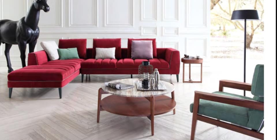 L-shaped Maroon coloured Upholstered Sofa
