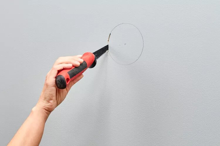 Measure and cut the light box hole