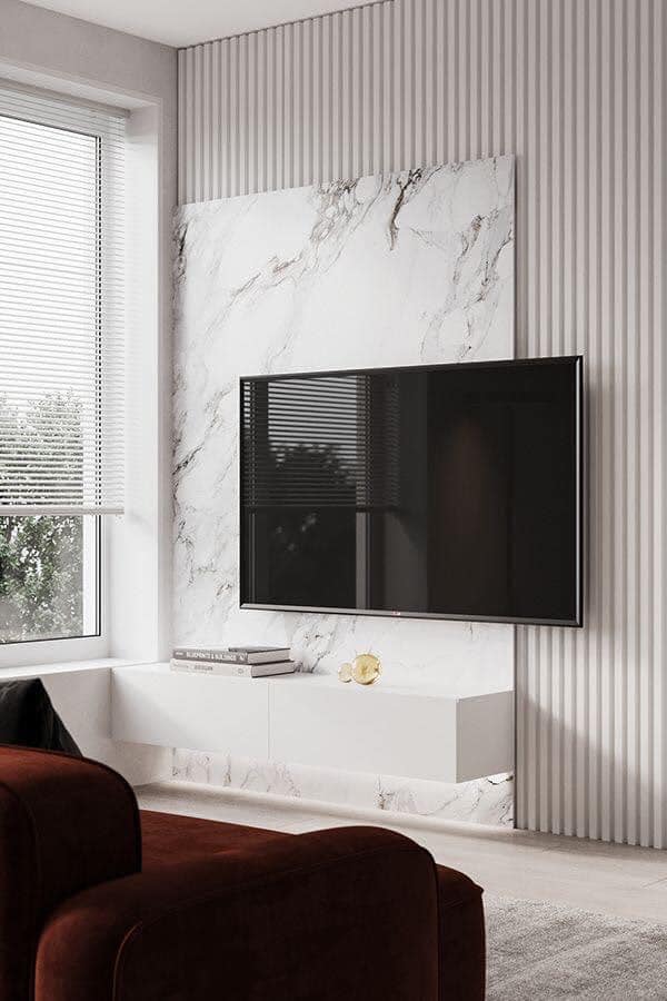 The White T.V. Unit Consists Marble Finish Wall Panelling