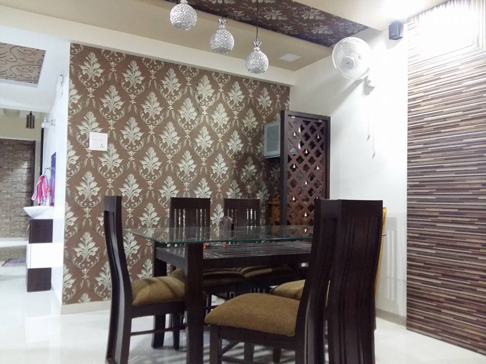 This Dark Brown Wooden Dining Table has Glass Table Top & Wooden Armless Chairs with High Backrests & Cushioned Seating